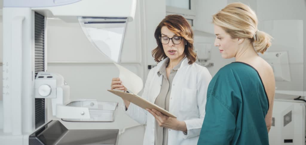 Doctor and Patient on Mammography Examination for breast cancer