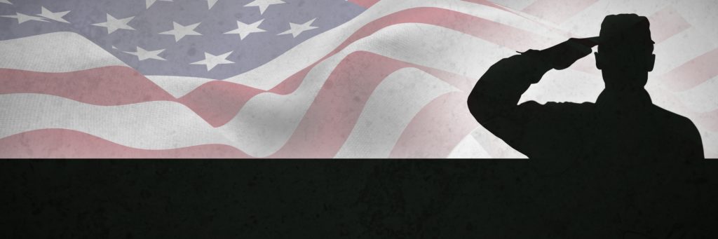 Composite image usa flag with veteran saluting