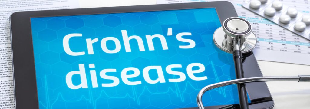 The word Crohn's disease on the display of a tablet