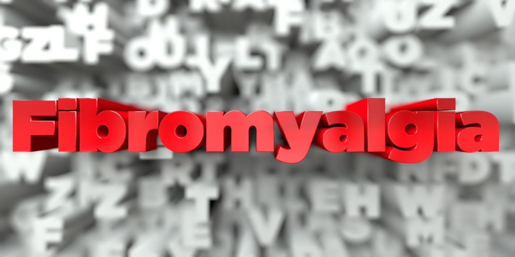 Fibromyalgia red text on typography background