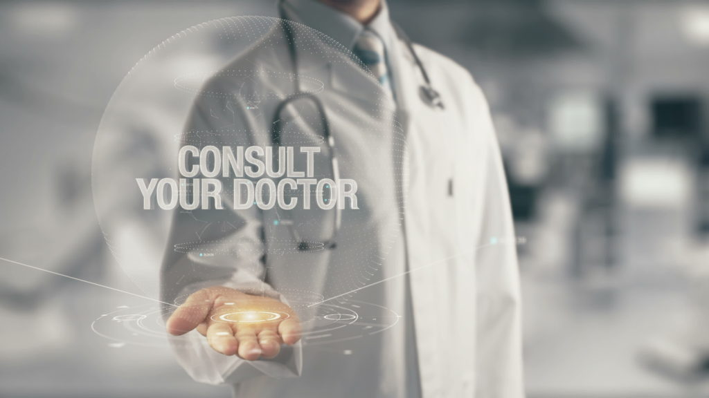 Doctor holding in hand Consult Your Doctor